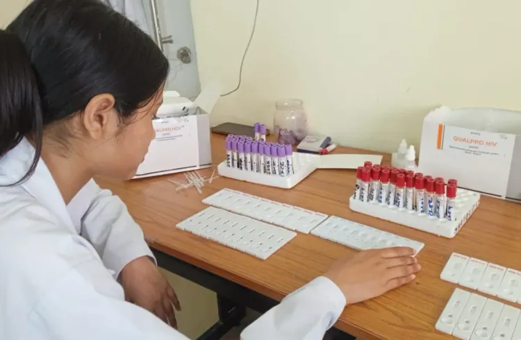 Student conducting sample analysis